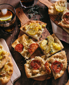 Italian Focaccia with potatoes and tomatoes