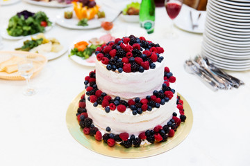 Wedding cake decorated with berries