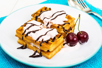 Viennese waffles with cream, chocolate and fruit
