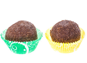 Round chocolate cakes on white background