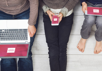 Family Sitting on Floor Using Devices Mockup 1