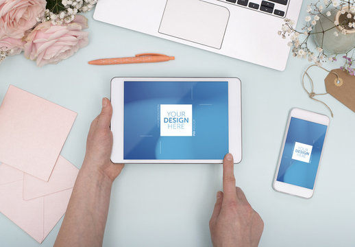 Top View Mockup of Tablet and Smartphone with Flowers