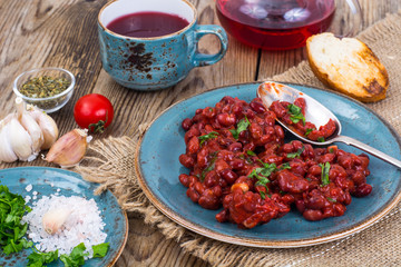 Baked hot beans in tomato sauce