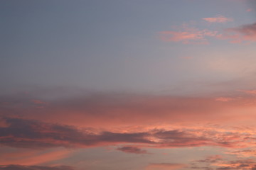 Sky with orange clouds beautiful in nature sunset background 