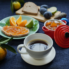 New Year's breakfast, coffee, bread, jam. Festive table setting.