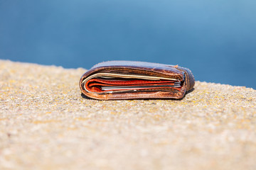 wallet lying unattended outdoor