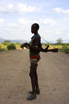Young Ethiopian man carrying AK47. Ethiopia