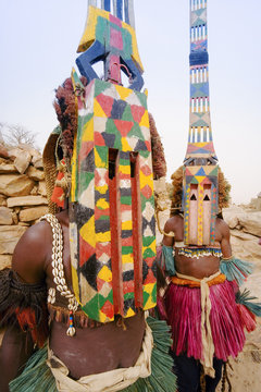 Africa, West Africa, Mali, Dogon Country, Bandiagara escarpment, Masked Ceremonial Dogon Dancers near Sangha