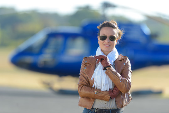condident female helicopter pilot