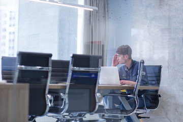 businessman working using a laptop in startup office