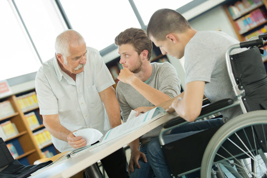 student in wheelchair in class