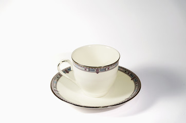 Cup and coffee, white background