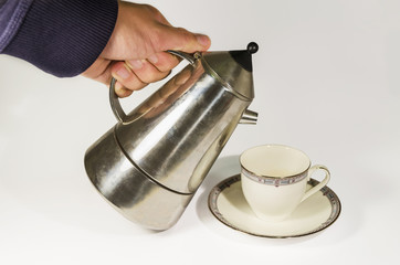 Cup and coffee, white background