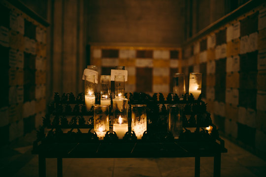 Vigil lights burning in a cathedral