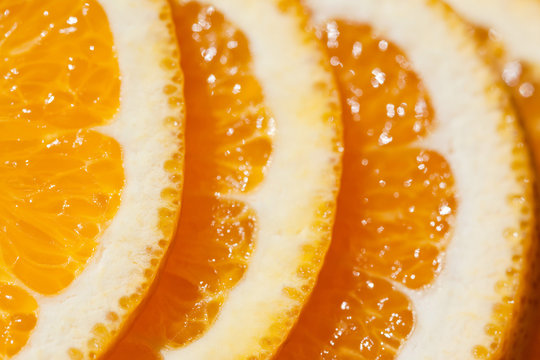 Macro of orange citrus fruit slices