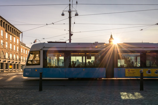 Gothenburg, Sweden - August 23, 2017: A Modern Blue Tram in Gothenburg with Sunflares