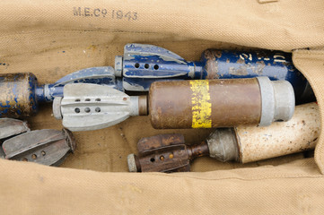 Bag with assorted WW2 bombs, grenades and mortars