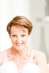 Attractive mature woman with a vivacious smile