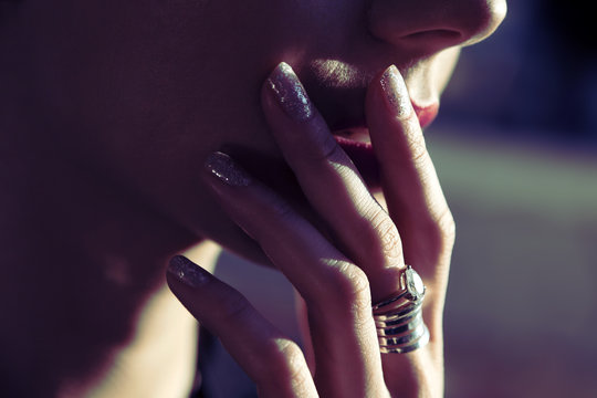 Elegant Woman's Hand on Mouth