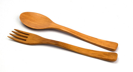 Wooden spoon and fork isolated on white background