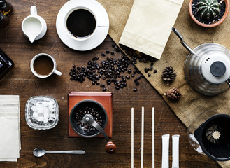 Aerial view of coffee setting on wooden table