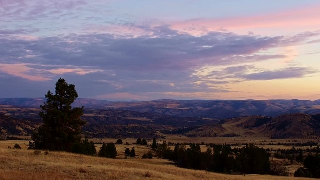 Dusk sunset of Juniper and old cattle ranch