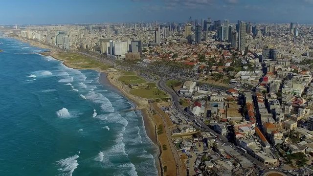 Aerial panning shot of Tel Aviv on a sunny day