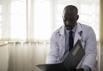 Fototapeta premium An African descent doctor is working at the hospital