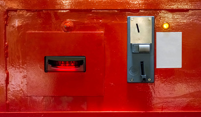 Red coin exchange machine with white template