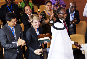 A Group of Business Pople Are Greeting One Another