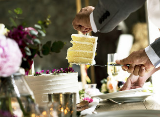 Hands getting a slice of a c