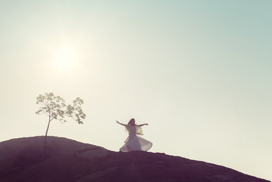 Young Woman Whirling Under the Open Sky