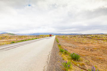 Icelandic road with red truck