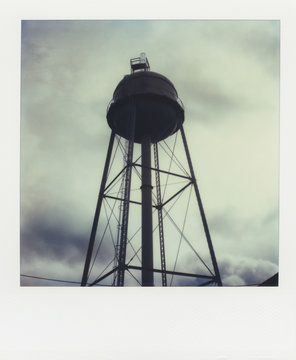 Water tower at dusk ( SX-70 print)