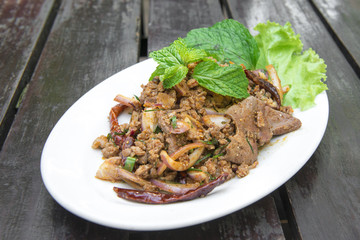 Spicy thai pork salad (Larb). Traditional thai food.