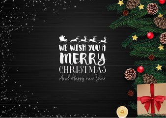 Naklejka premium Christmas wooden background with christmas elements