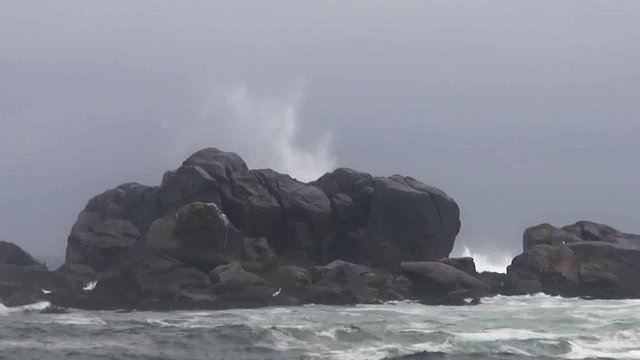 Waves hit the rocks on the Isla Damas beach