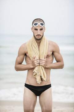 Portrait of swimmer by the sea