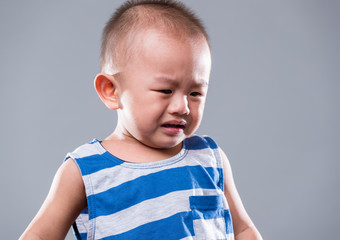 Naklejka premium Baby boy sad