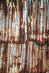 Rusty corrugated metal wall