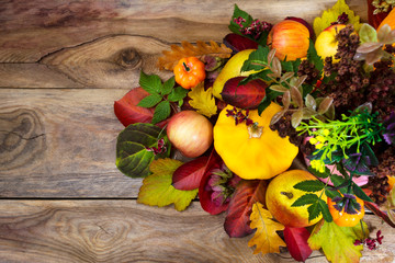 Thanksgiving background with wild grass, yellow squash, pears
