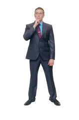 Business man stands holding his hands isolated on white background.