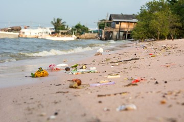 Beach pollution. So many trashes on sea beach