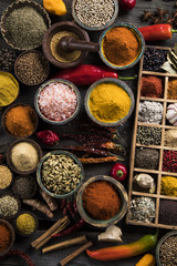 Different types of Assorted Spices in a wooden box