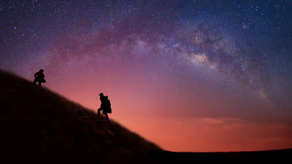Detail of the milky way with photographers, panoramic view UltraWide 16:9 Resolution