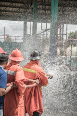 Firefighters rehearse fire fighting plans at LPG storage facilities.