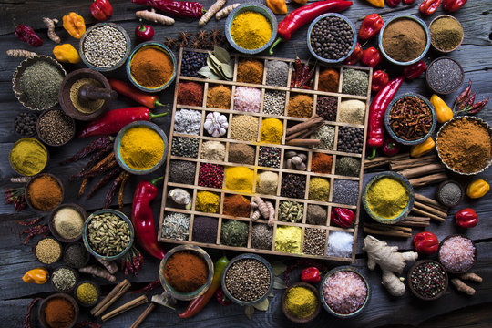 Different types of Assorted Spices in a wooden box
