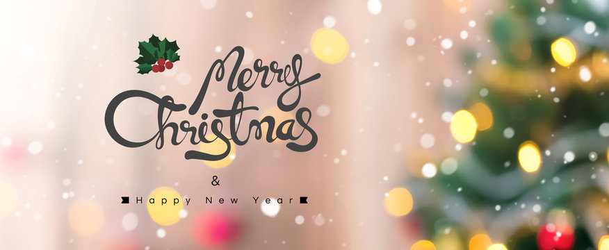 Merry Christmas and Happy New Year text on colorful bokeh background