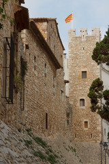 Fototapeta na wymiar Old tower in the historic part of Sitges town, Spain