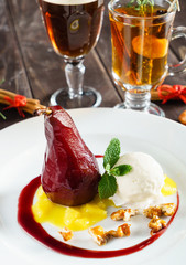 Poached pears in red wine with cinnamon and anise